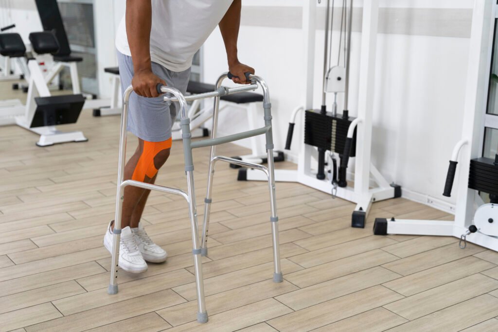 injured man doing physiotherapy exercises walking